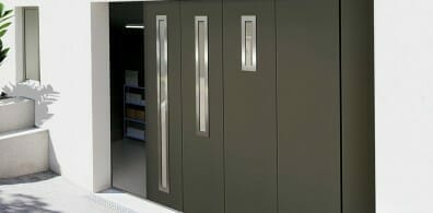 Porte de garage sectionnelle coulissante