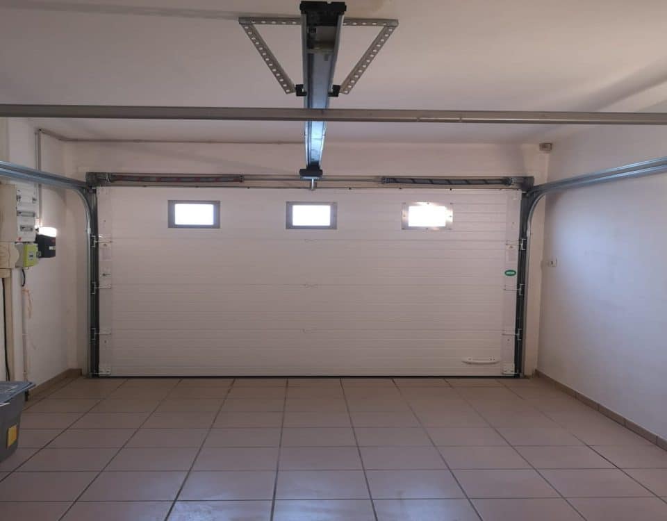 remplacement d'une porte de garage à la Ferté-Alais
