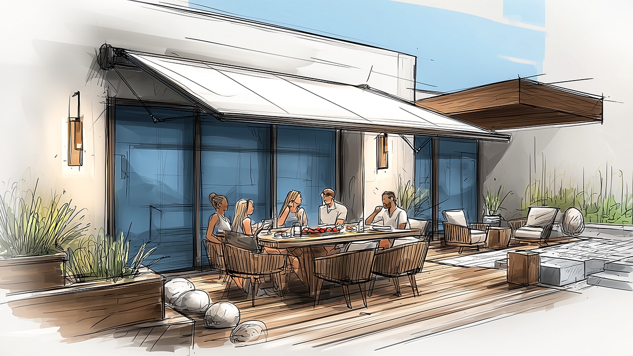 Store-banne déployé au-dessus d'une terrasse en bois avec repas convivial à l'ombre